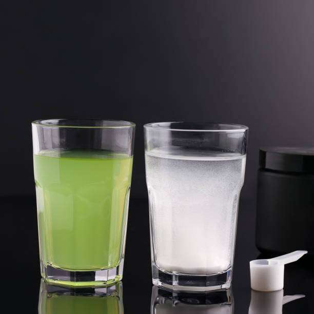 Drinks useful for fitness in glasses on a black background