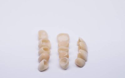 Metal Free Ceramic Dental Crowns. Zirconium tooth crown isolate on wite background. Aesthetic restoration of tooth loss. Ceramic zirconium in final version.